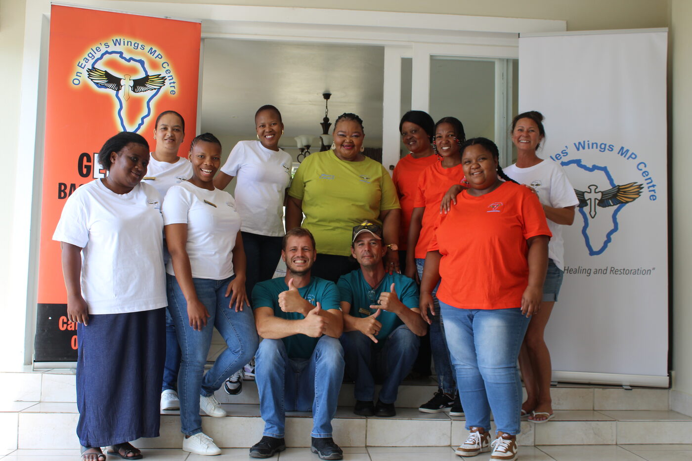 The On Eagles' Wings team and community members in Jeffreys Bay
